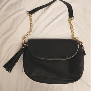 Black Madison West shoulder/crossbody med-sized black bag w/ gold chain accents